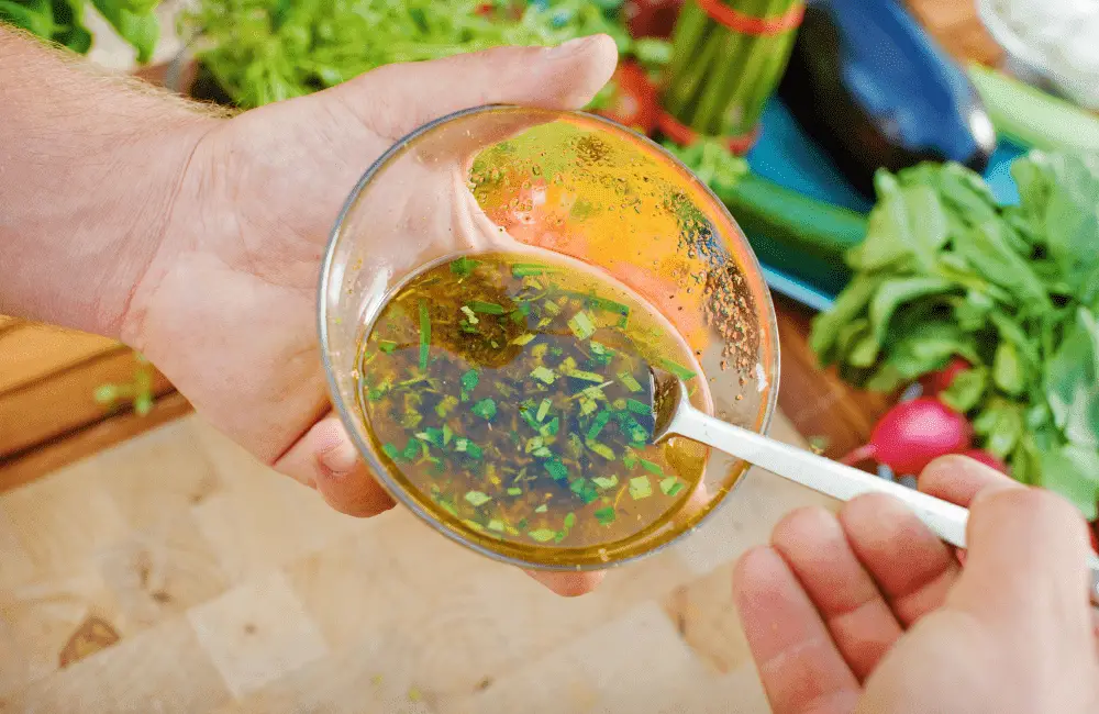 Stirring the marinade to combine all ingredients thoroughly.