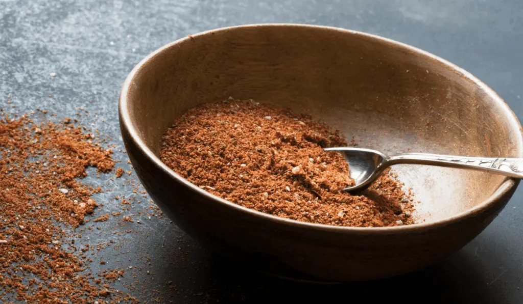 Close-up view of the vibrant chicken taco seasoning, showcasing its rich texture and color.