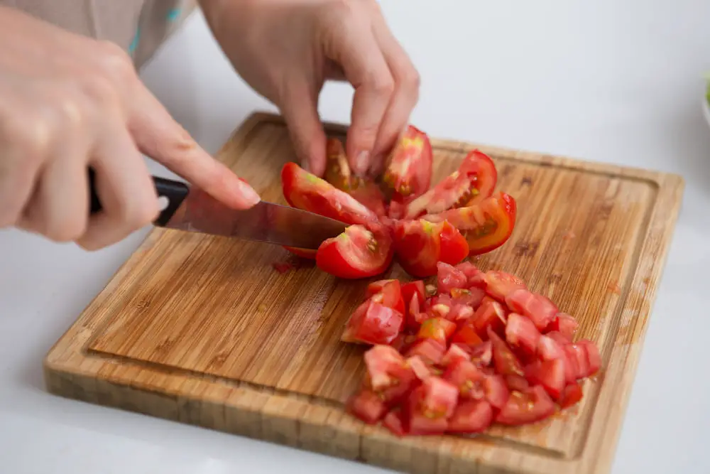 Dicing tomatoes for the Italian Bruschetta recipe.