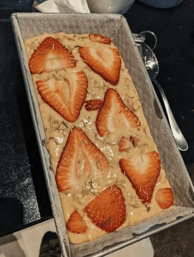 strawberry bread recipe: Raw strawberry bread batter in a loaf pan, ready for baking.