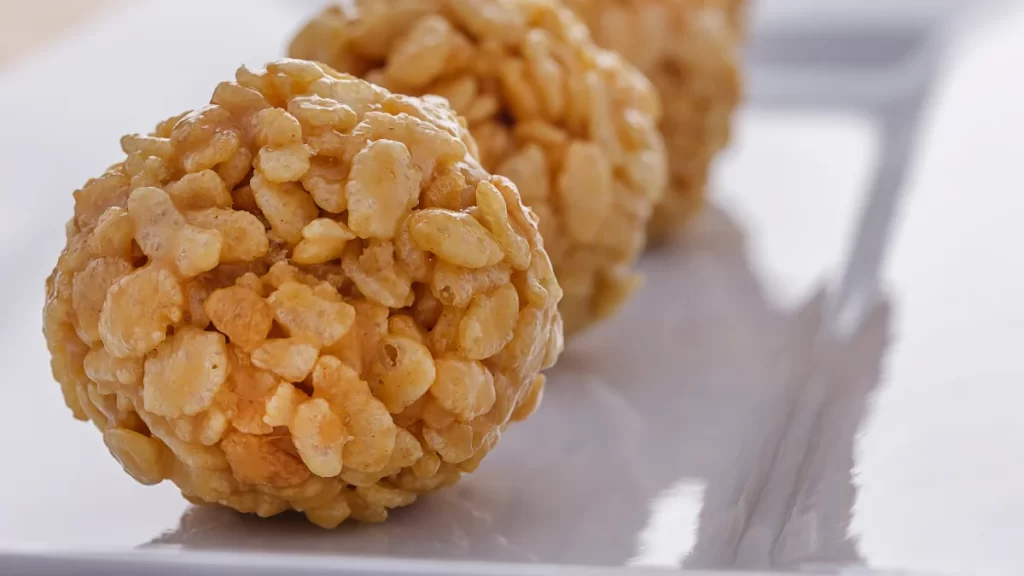 Caramel-coated marshmallow balls sprinkled with crispy Rice Krispies.