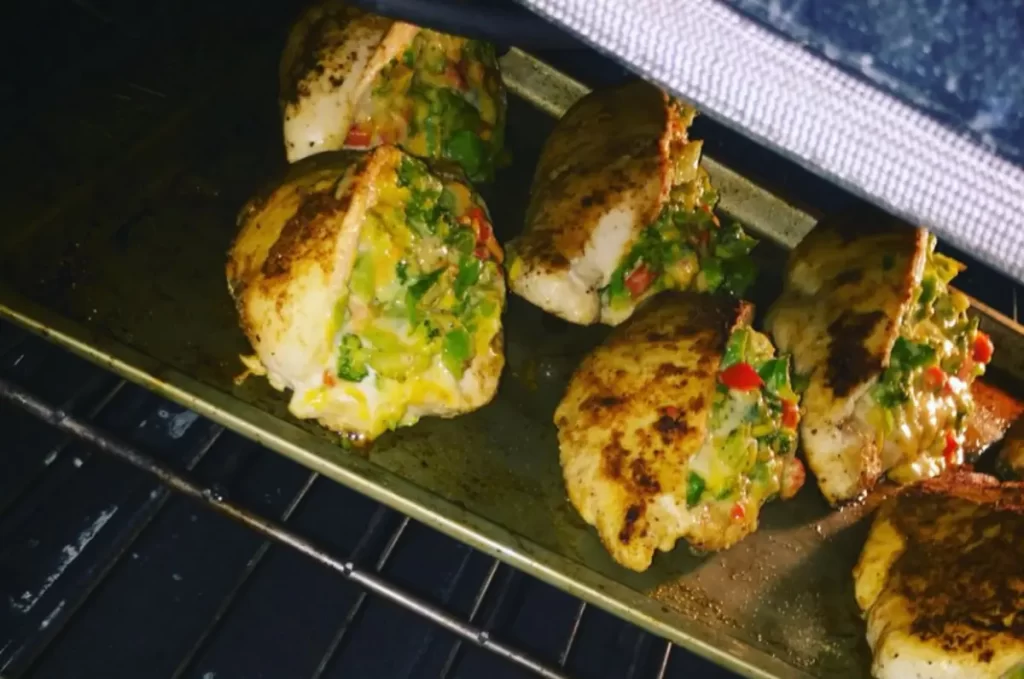 Delicious broccoli and cheese stuffed chicken breast in the oven