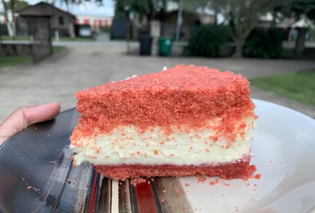 Strawberry Cheesecake Bars with a vanilla wafer crust and creamy strawberry filling, perfect for dessert.